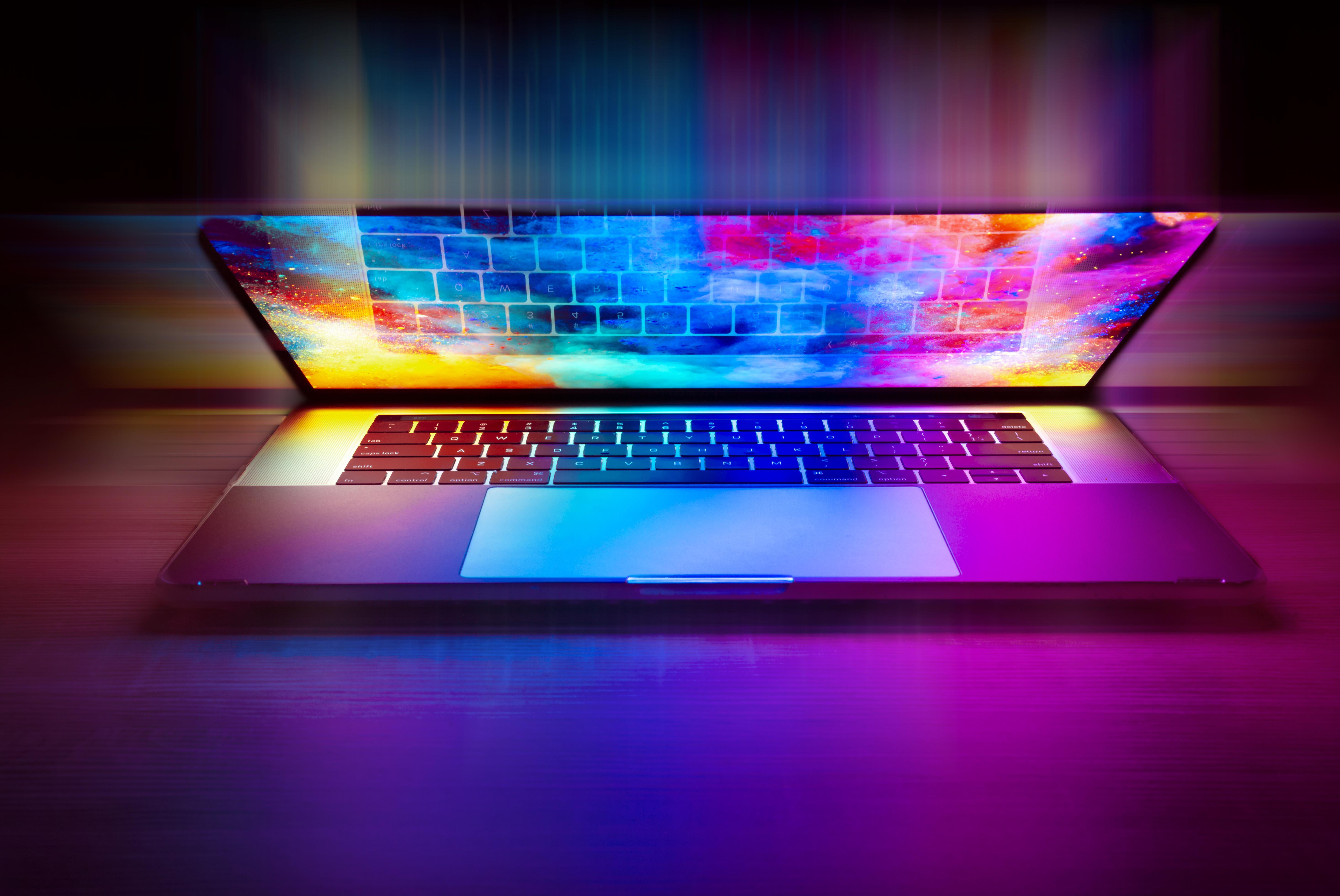 Laptop screen emitting rainbow colors