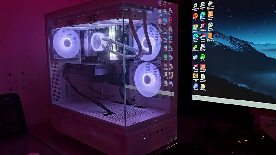 Skytech Gaming Azure 3 Desktop glowing a a dark room