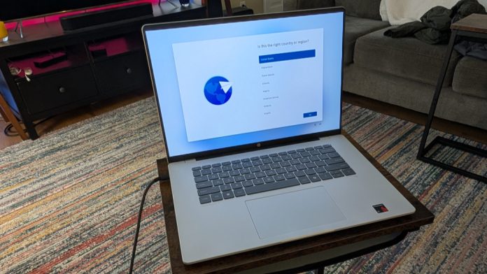 HP OmmiBook 5 (16-fb0299nr) laptop placed on a floor