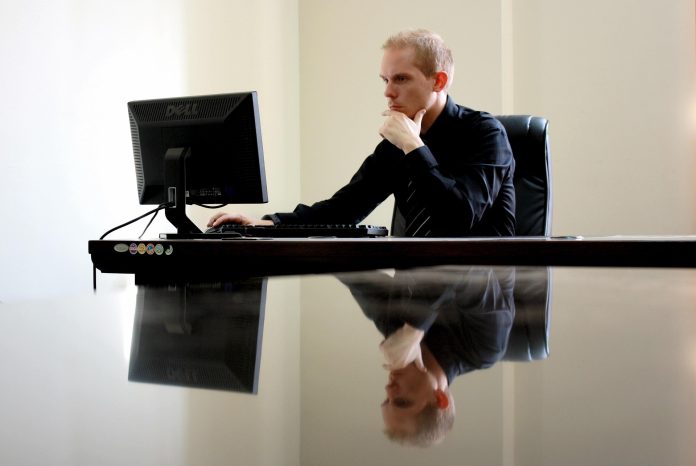 Man using a monitor in an office